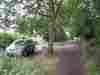 The car park is unsurfaced