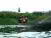 Getting back in after portaging the weir
